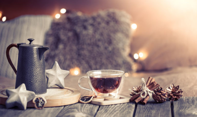 home comfort, details of the festive interior on a wooden table